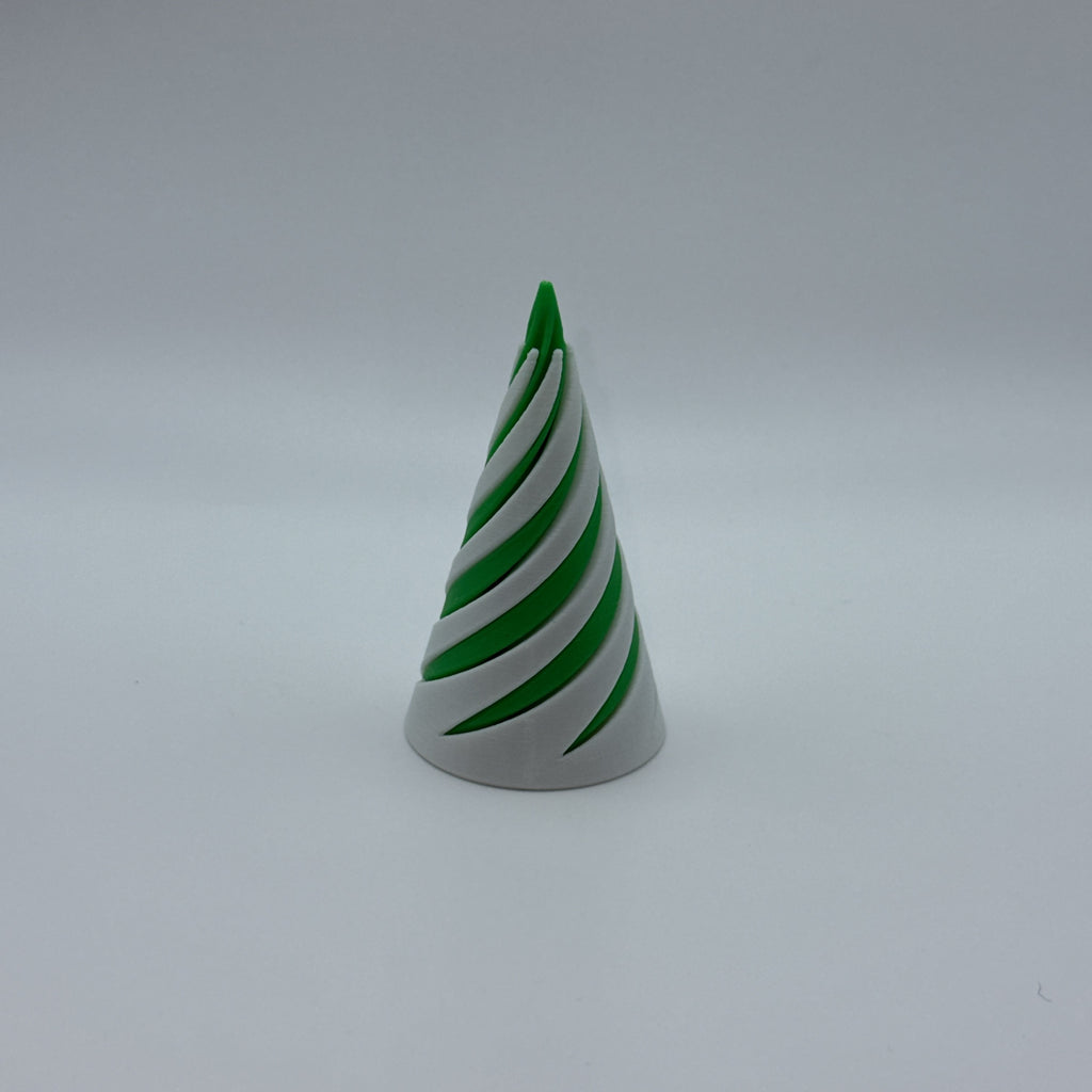 Green and white medium Spirally striped cone-shaped fidget toy on a gray background
