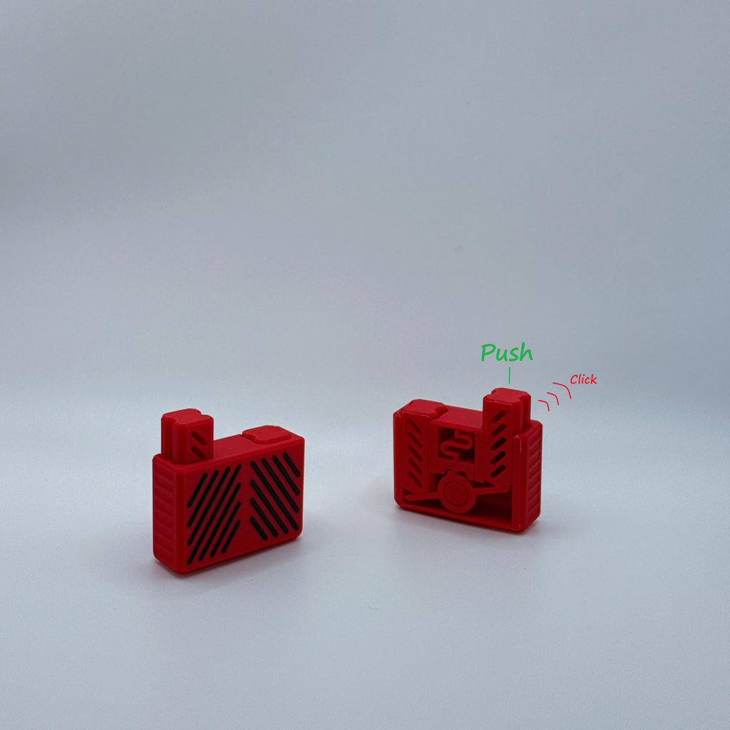 Two red Clik Clak Fidget toys with 'Push' and 'Click' text.